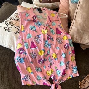 A lilo and stitch shirt without sleeves great for a trip to Disney or Hawaii!!!